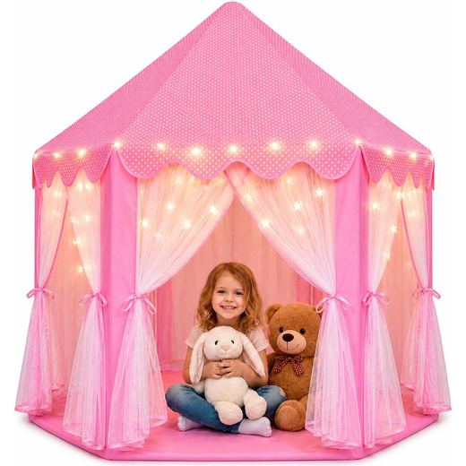 Girl with plush toys inside the Orian princess castle tent